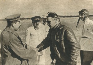 Close by are: Voroshilov, L.M. Kaganovich and Belyakov.