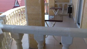 Massive railing made ​​in classic style.
