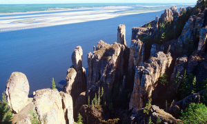 Lena Pillars, a natural rock formation along the banks of the Lena River in far eastern Siberia. The pillars