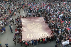 Giant Russian Passport Carried in Eastern Ukraine on Russia Day