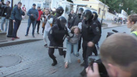 Viral Clip of Russian Policeman Punching Young Woman During Protests Stirs Anger
