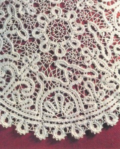 Detail of a bobbin-lace serviette showing a zoomorphic design