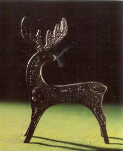 Filigree metal figurine of a young deer