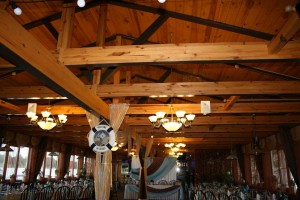 Wooden beams look very good and can hang beautiful lighting and décor.