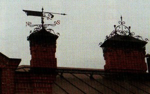 Forged wrought-iron weather vane and visors for pipes look very impressive setting a romantic mood.