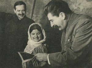 Comrade Stalin and Andreev and pioneer Mamliyaht Nahangova (the picture was taken at the meeting of the advanced farmers and female collective farmers of Tajikistan and Turkmenistan, December 1935)