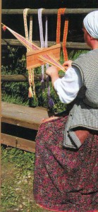 A woman and a loom.