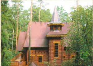 wooden house in the forest.
