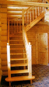 A wooden staircase in a wooden house.