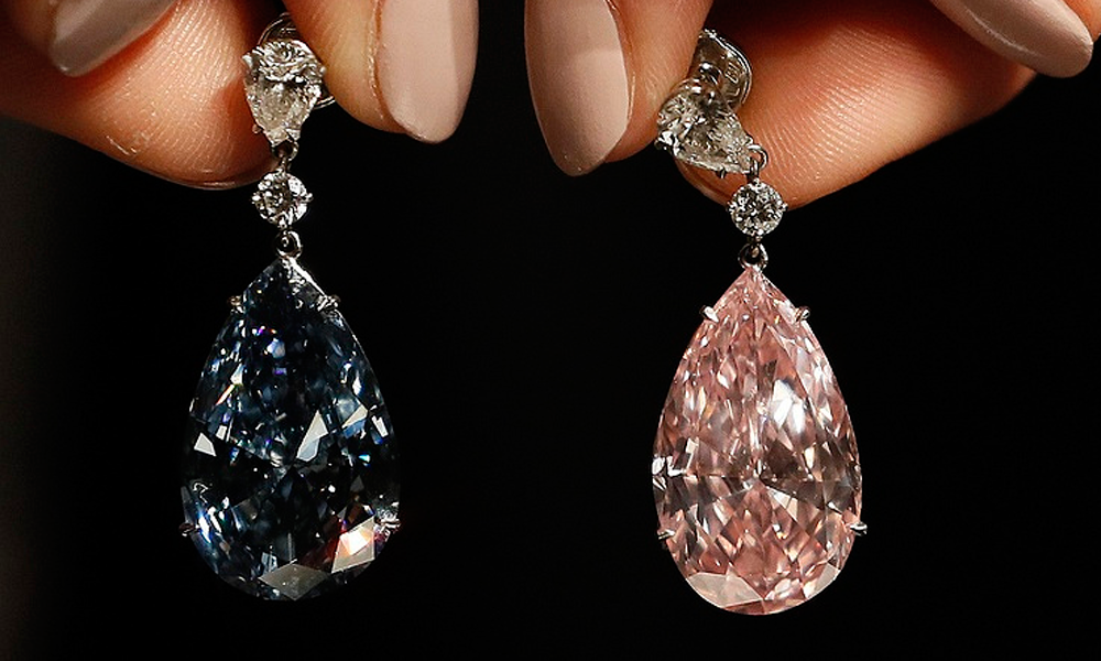Sotheby’s sells diamond earrings for record $57 million