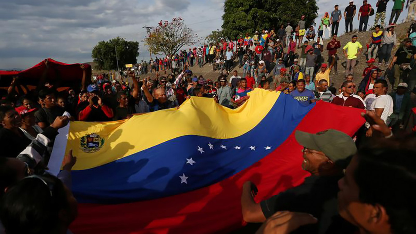 U.S. Warns Russia Over Troops in Venezuela, Threatens Sanctions