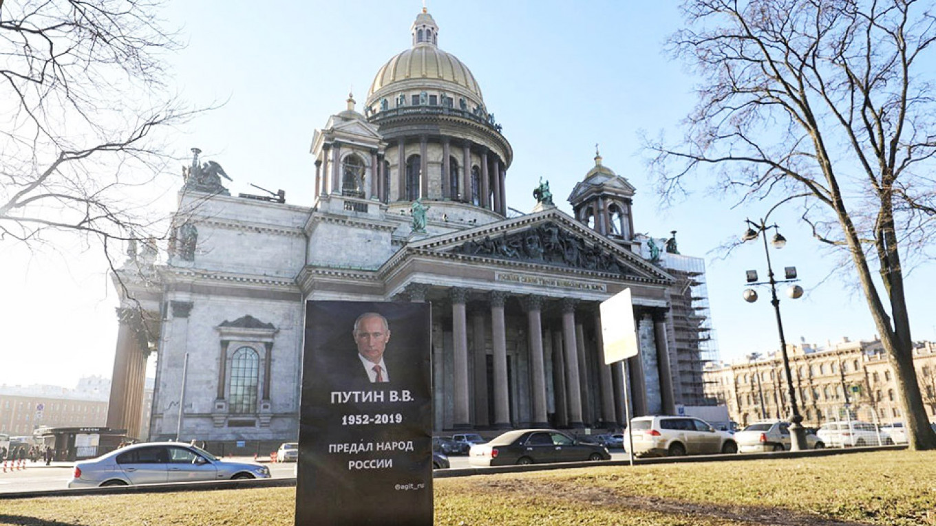 Activists Install Mock Putin Gravestone in St. Petersburg