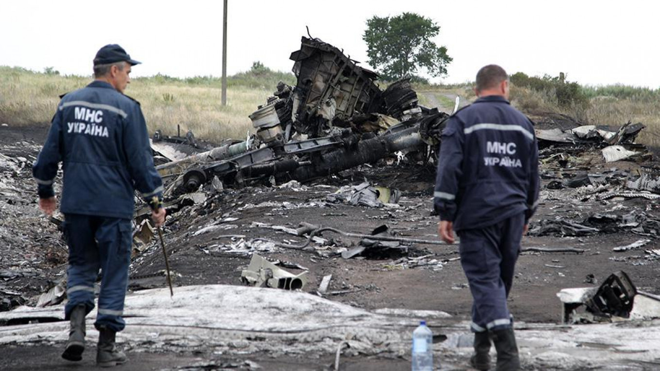 Family Of American Killed in Downed MH17 Jet Sues Russia Banks, Money-Transfer Firms