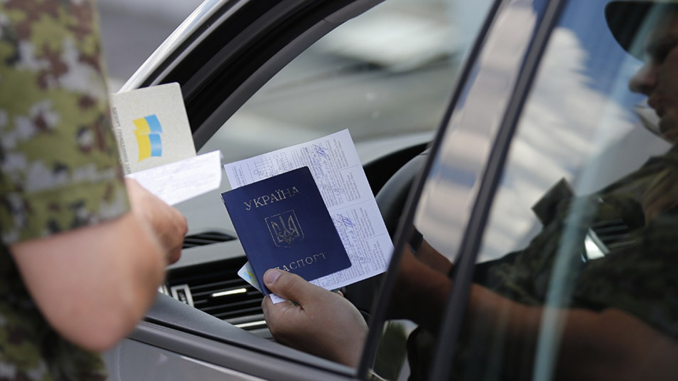 Russia Opens First Center To Issue Russian Passports to East Ukrainians