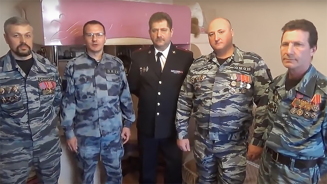 Russian Riot Police Complain of Evictions in Video to Putin