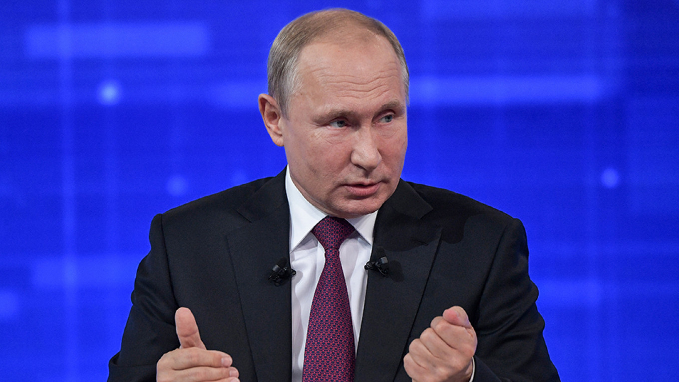 Putin, Hit by Ratings Drop, Tells Russians a Better Life Awaits