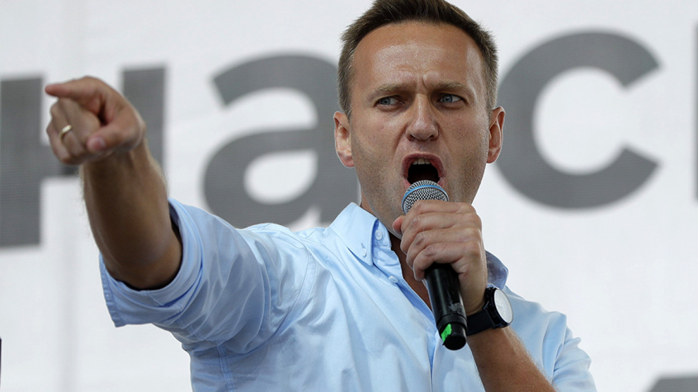 Kremlin Critic Navalny Jailed for 30 Days Before Opposition Protest