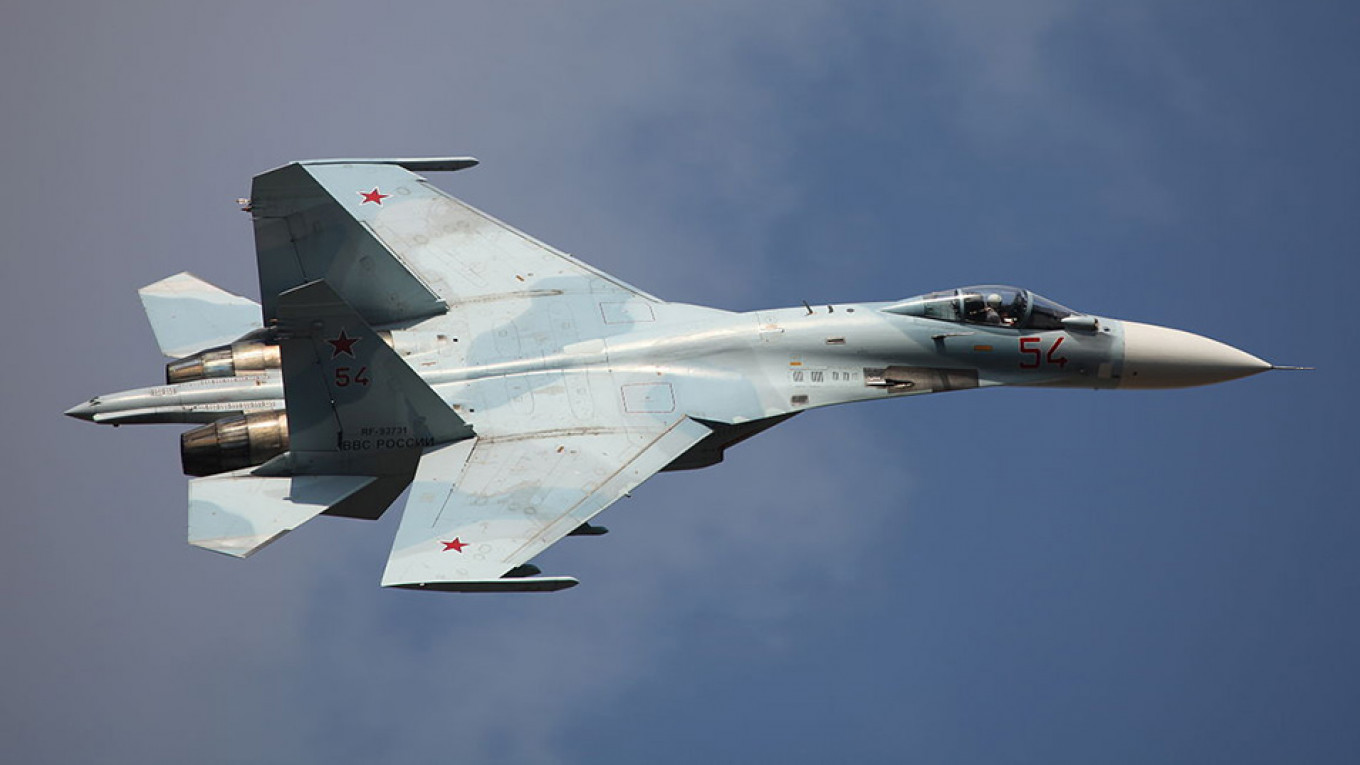 Russian Fighter Jets Push NATO War Plane Away