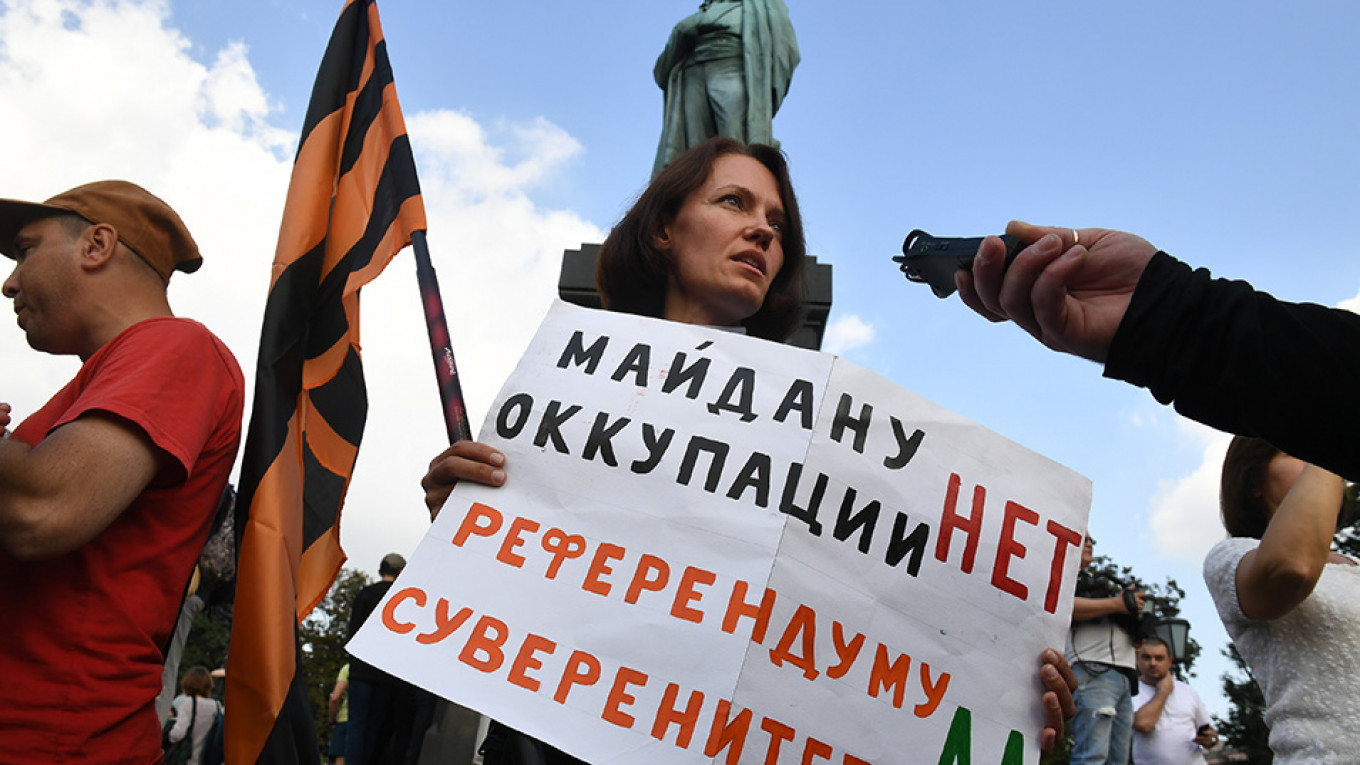 Most Russians Don’t Believe ‘Western Meddling’ Is to Blame for Moscow Protests, Poll Says