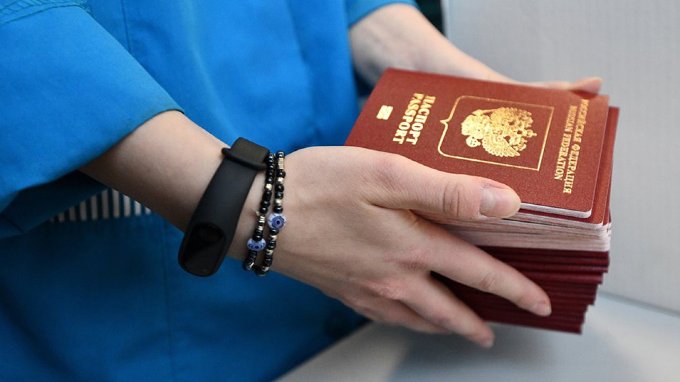 170K in East Ukraine Get Russian Passports Under Putin’s Fast-Track Program