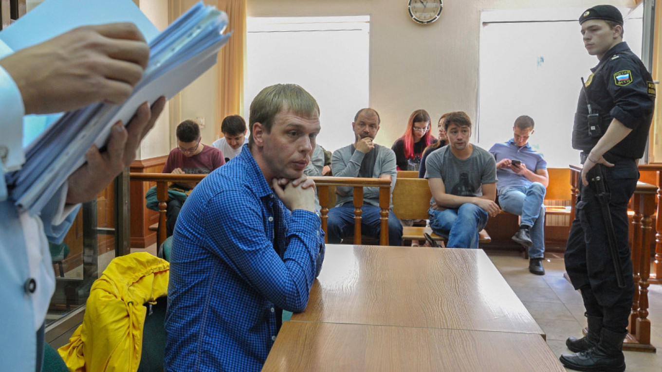 Former Officers Detained Over Investigative Journalist Golunov’s Framing