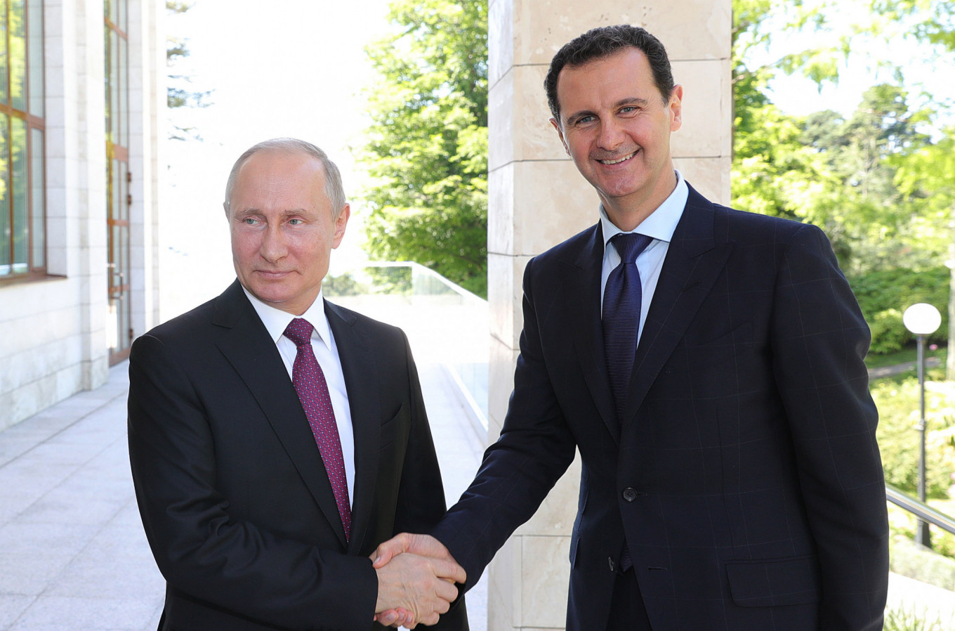 Putin Makes Rare Visit to Syria, Meets Assad Amid Middle East Tensions