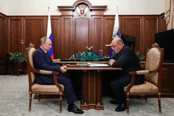 Putin Puts Forward Little-Known Tax Chief as New Russian PM