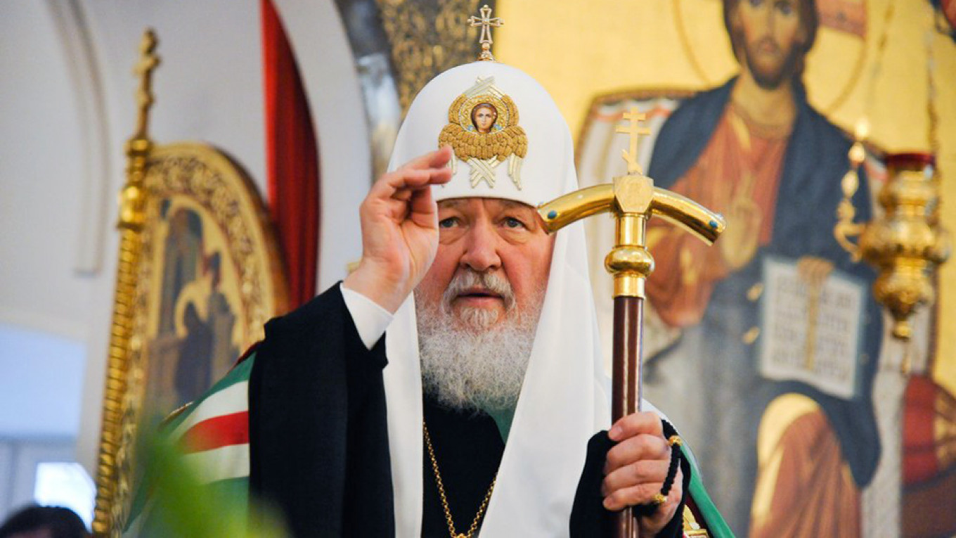 Head of Russia’s Orthodox Church Tells Worshippers to Stay Home