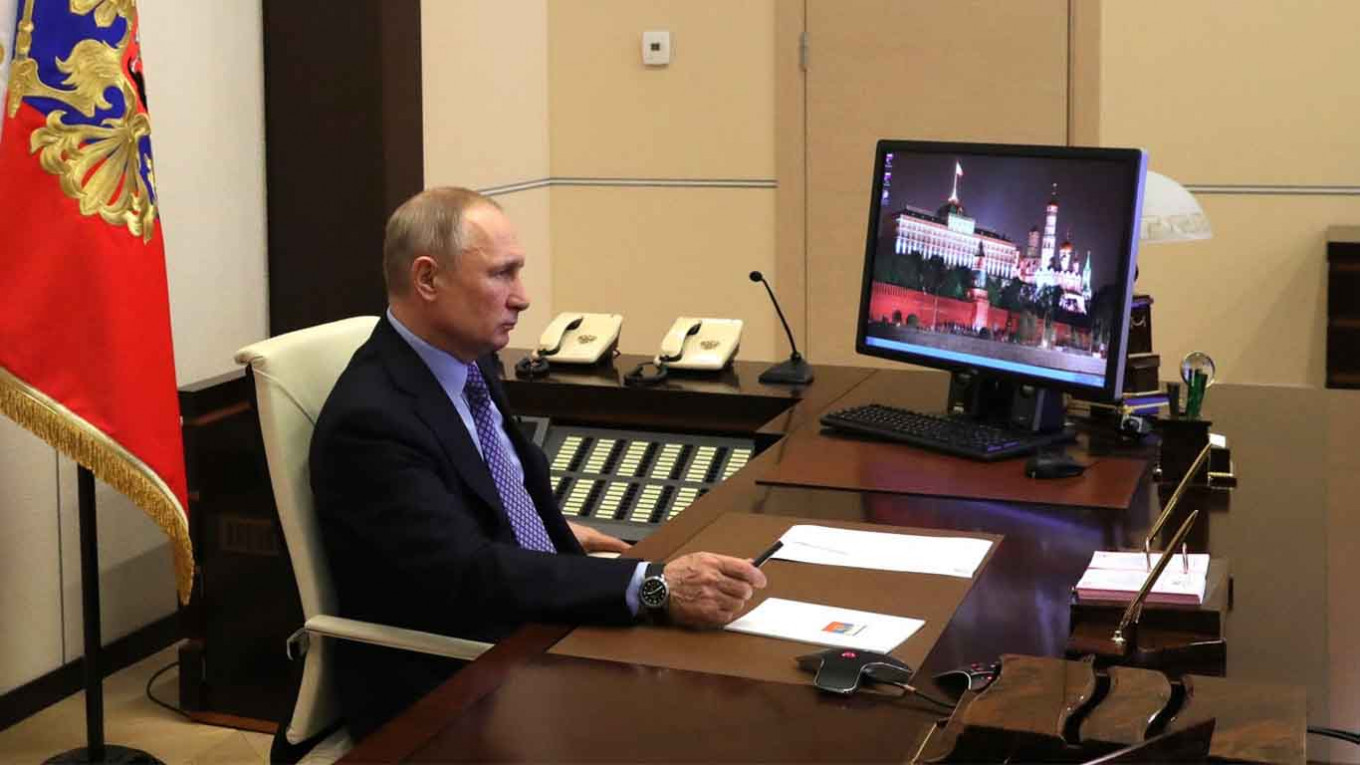 Putin Working Remotely After Meeting Infected Doctor, Kremlin Says