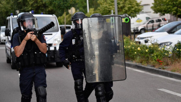 French Police Stage Raids in City Marked by Chechen Unrest
