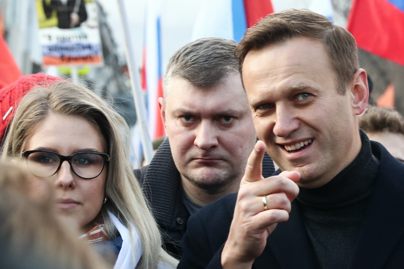 Vowing Return To Russia, Navalny Accuses Putin Over Poisoning