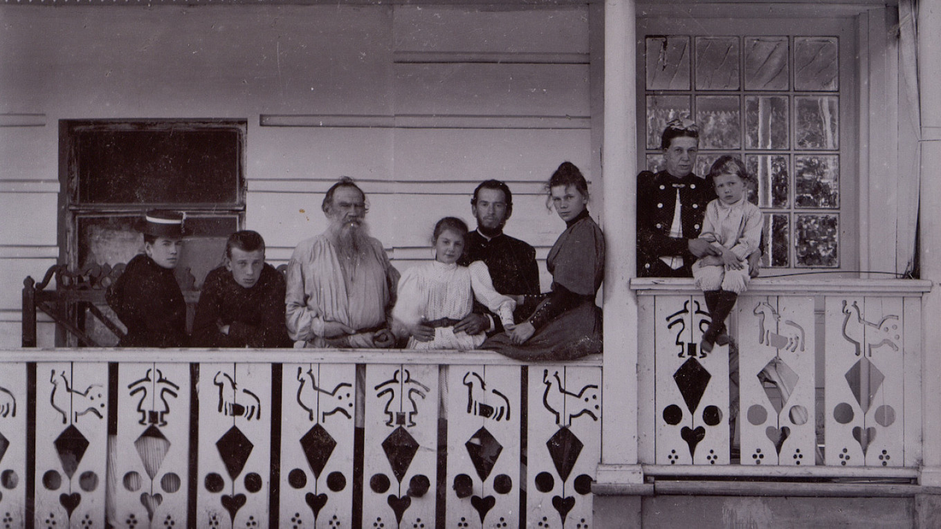  Leo Tolstoy, his wife Sophia Andreyevna and their children on the veranda of the writer's estate. Yasnaya Polyana 