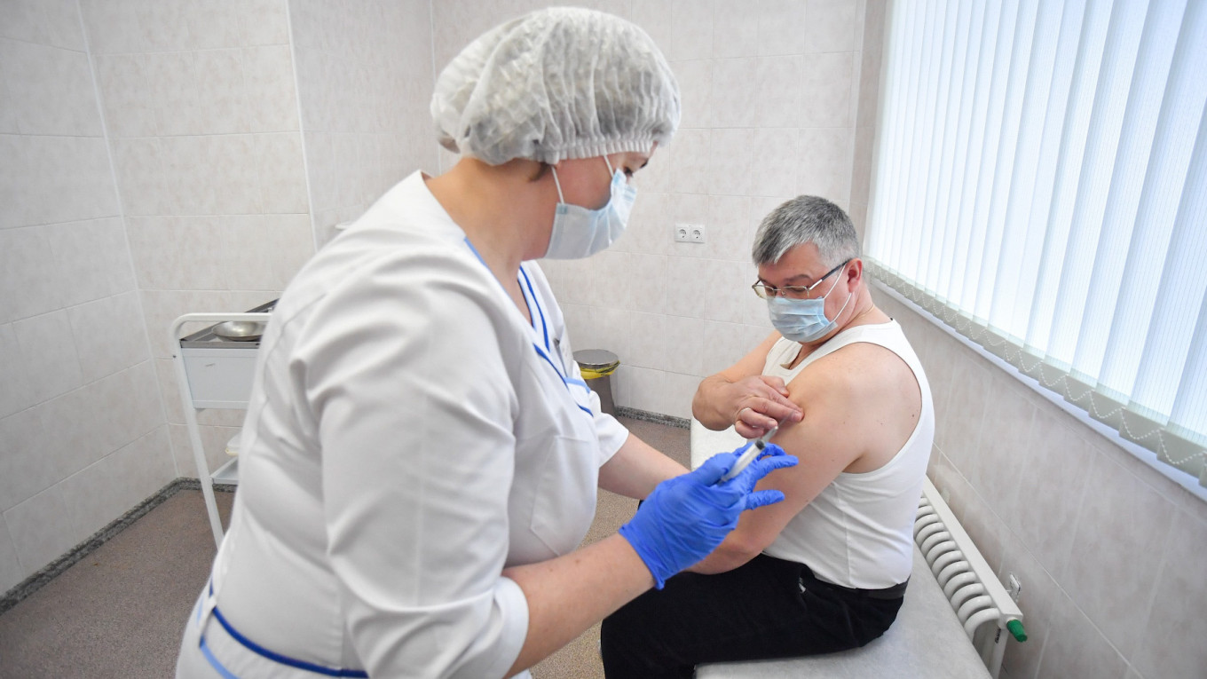 In Photos: Russia Rolls Out Sputnik Vaccine