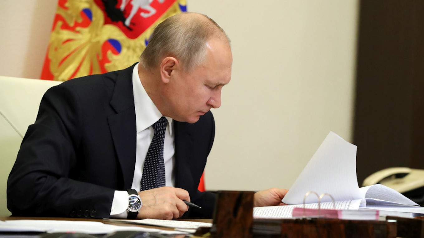 Putin Signs Controversial ‘Foreign Agent’ Law Expansion