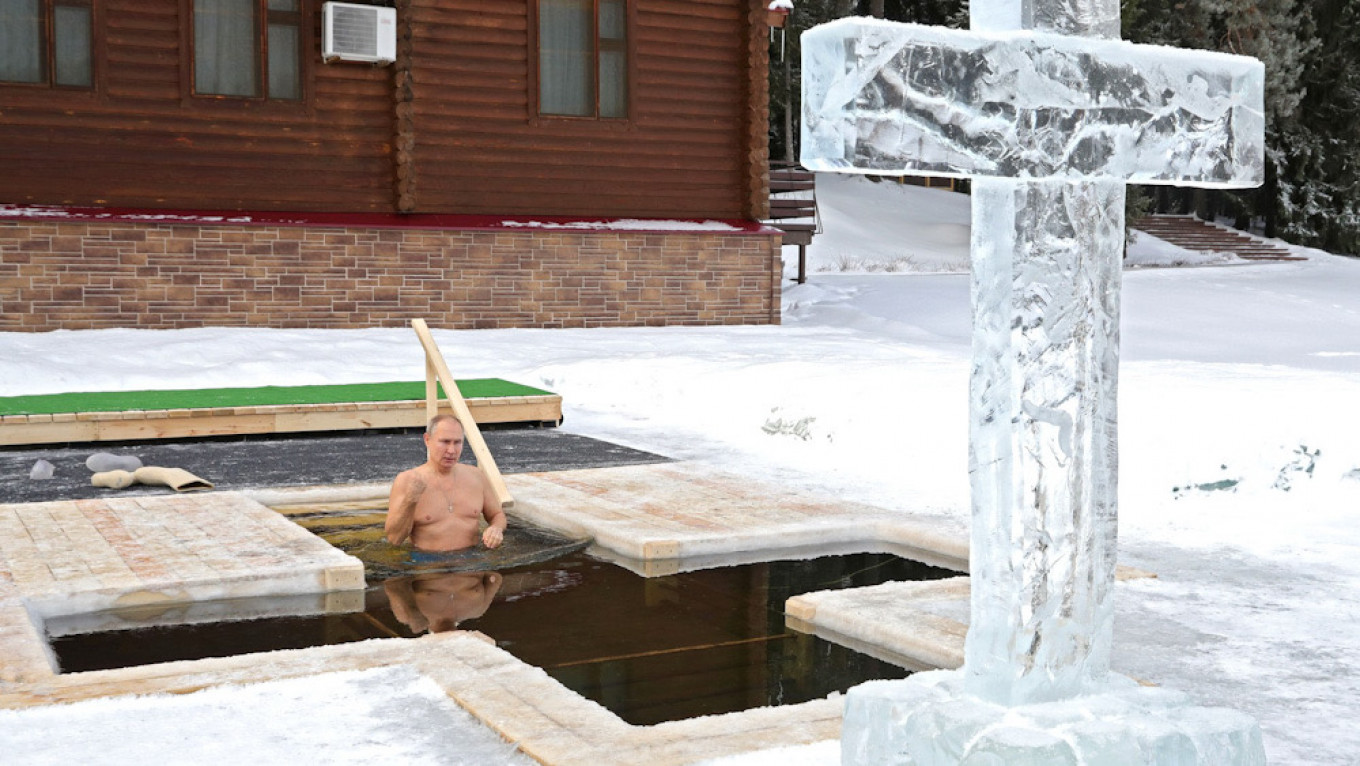 Putin Takes Icy Dip in Orthodox Christian Ritual