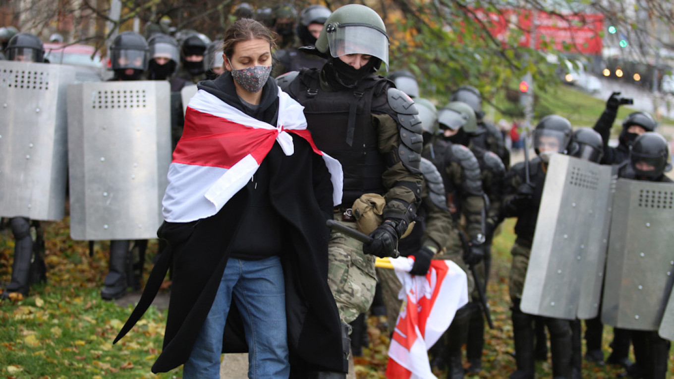 Belarusian Police Mount Raids on Journalists, Activists