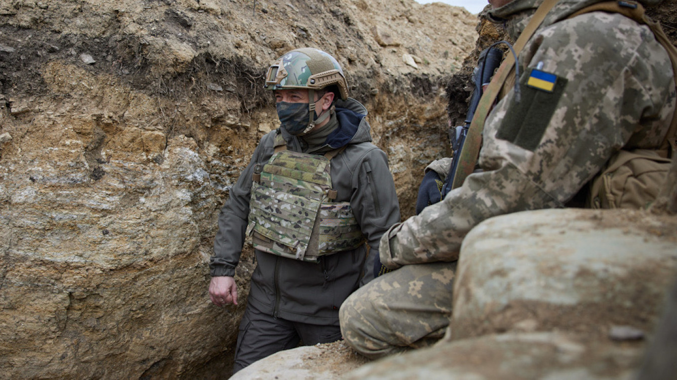 Ukraine’s Zelenskiy on Frontline as Merkel Urges Putin to Pull Back Troops