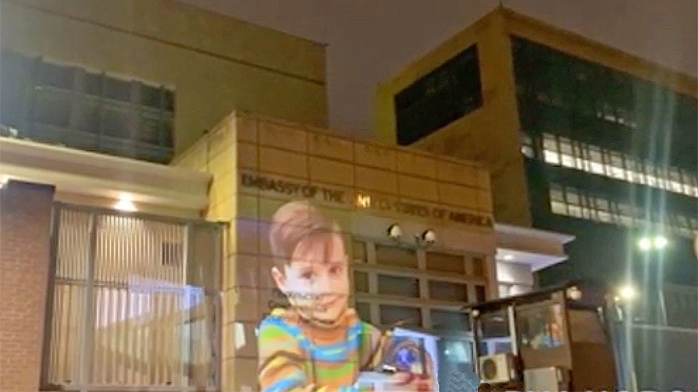 Projection Beamed on Moscow Embassy Targets ‘U.S. Warmongers’