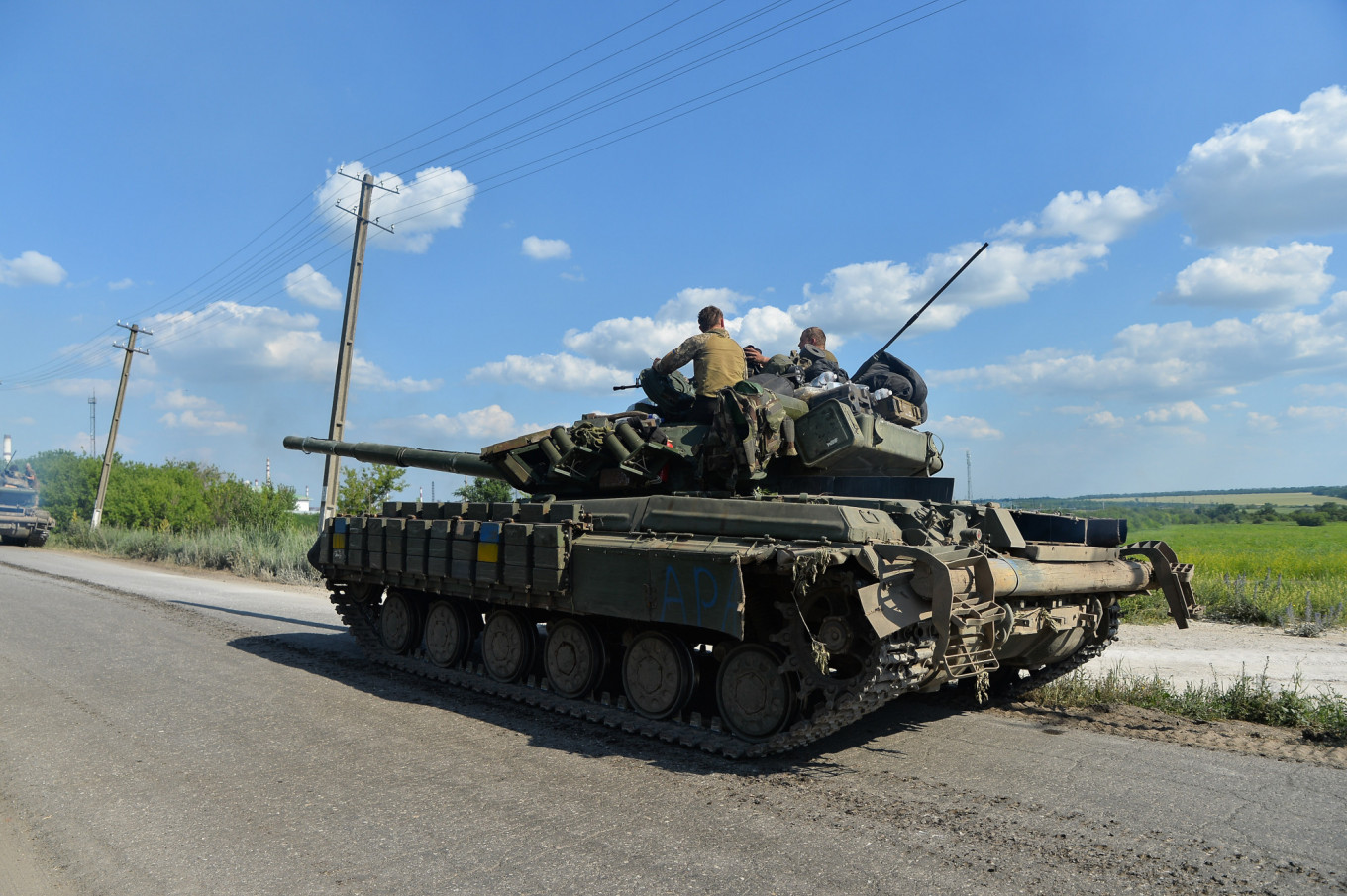 Road Shelled as Russian Forces Battle for Devastated Ukraine City