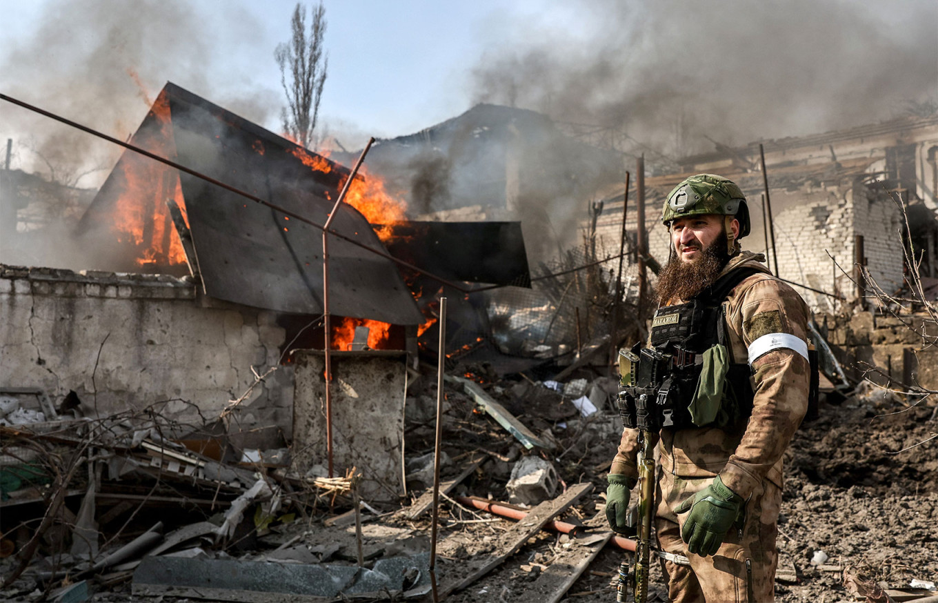  An officer from a Chechen Interior Ministry unit takes part in a mop-up operation in the Ukrainian city of Mariupol. Sergei Bobylev / TASS 