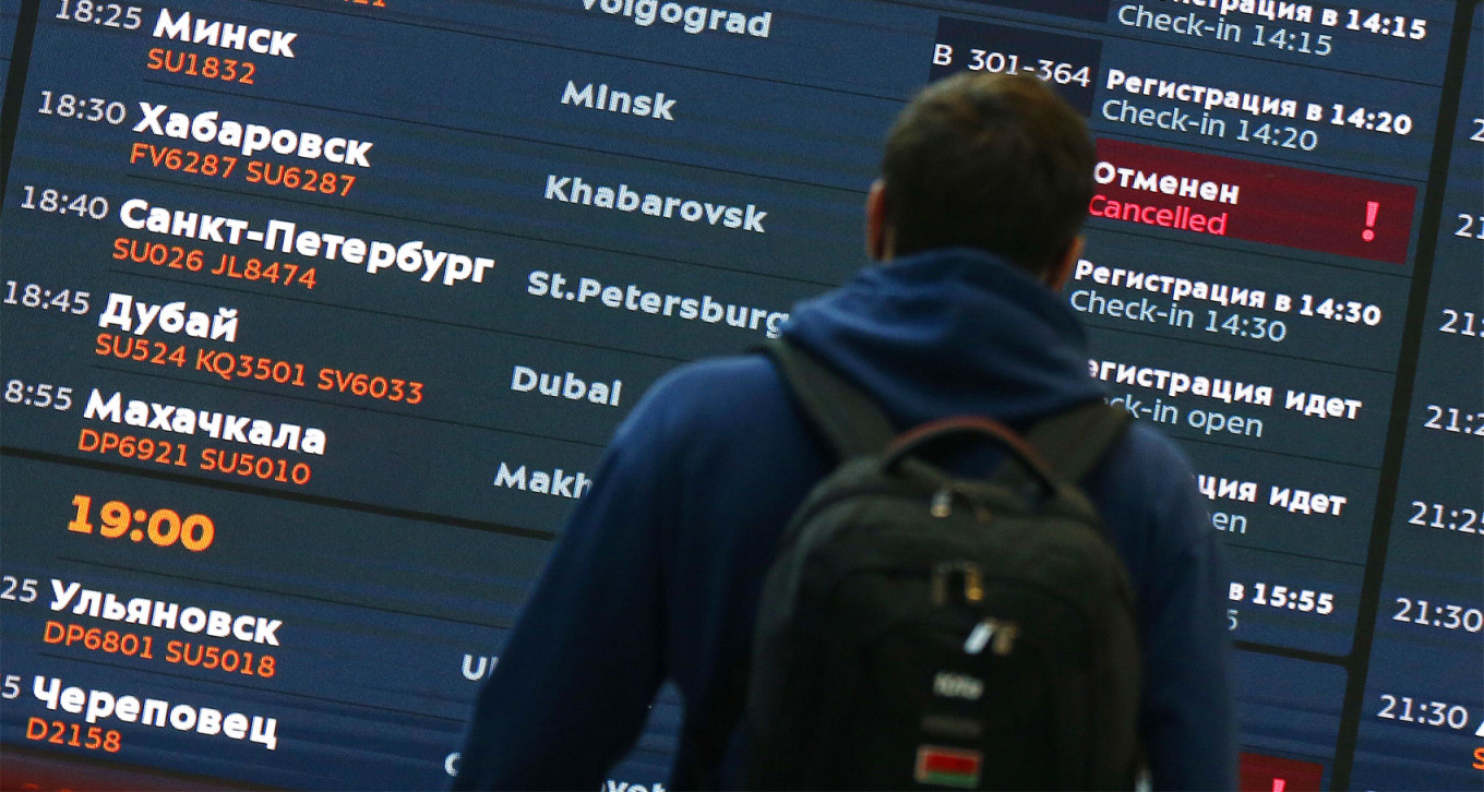  Departure board at a Moscow airport. Sergei Vedyashkin / Moskva News Agency 
