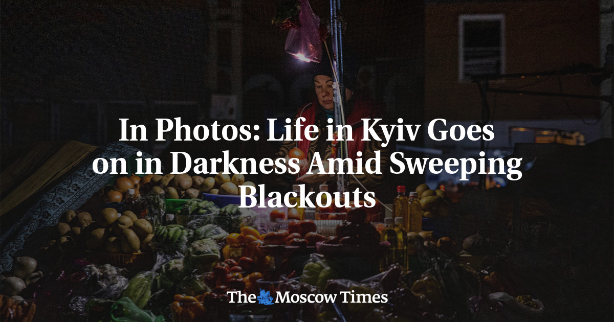 In Photos: Life in Kyiv Goes on in Darkness Amid Sweeping Blackouts