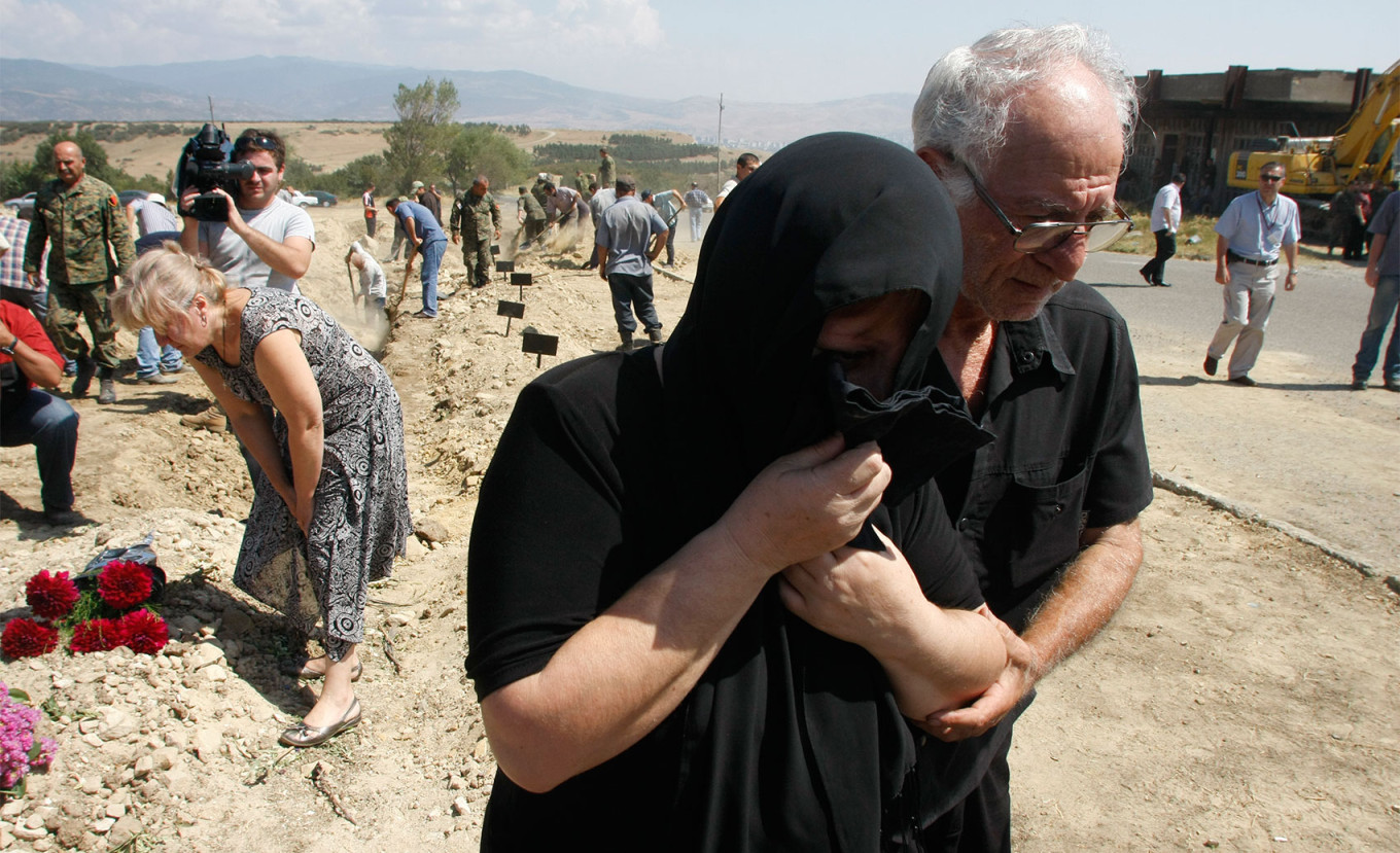  Family crying in the aftermath of the Russian bombing of Gori, Georgia in 2008. Giorgi Abdaladze (CC BY-SA 4.0) 