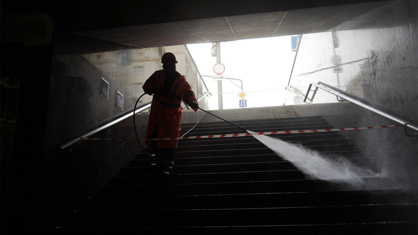  Cleaning of an underground passage in Moscow. Pelagia Tikhonova / Moskva News Agency 