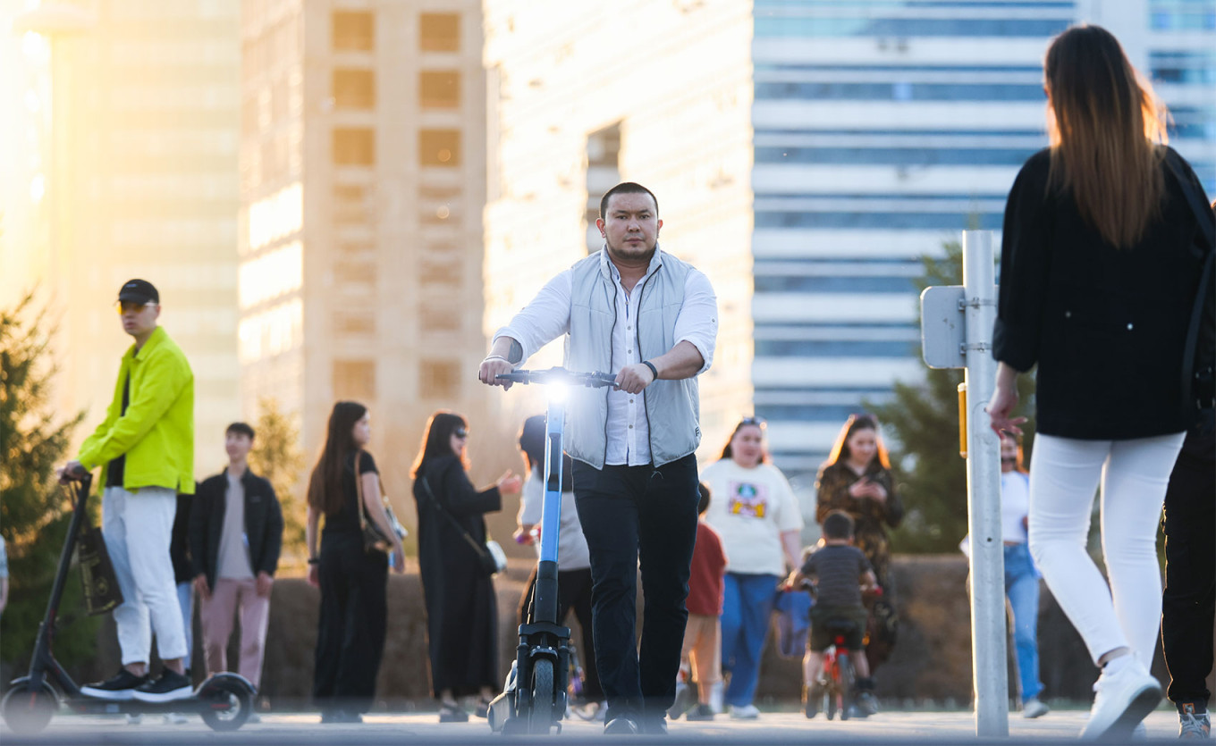  Locals in a square in Astana, Kazkahstan's capital. Sergei Fadeichev / TASS 