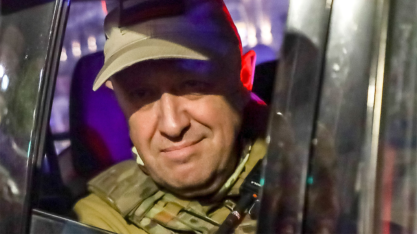  Prigozhin looks out from an SUV as he leaves Rostov-on-Don, June 24. AP / TASS 