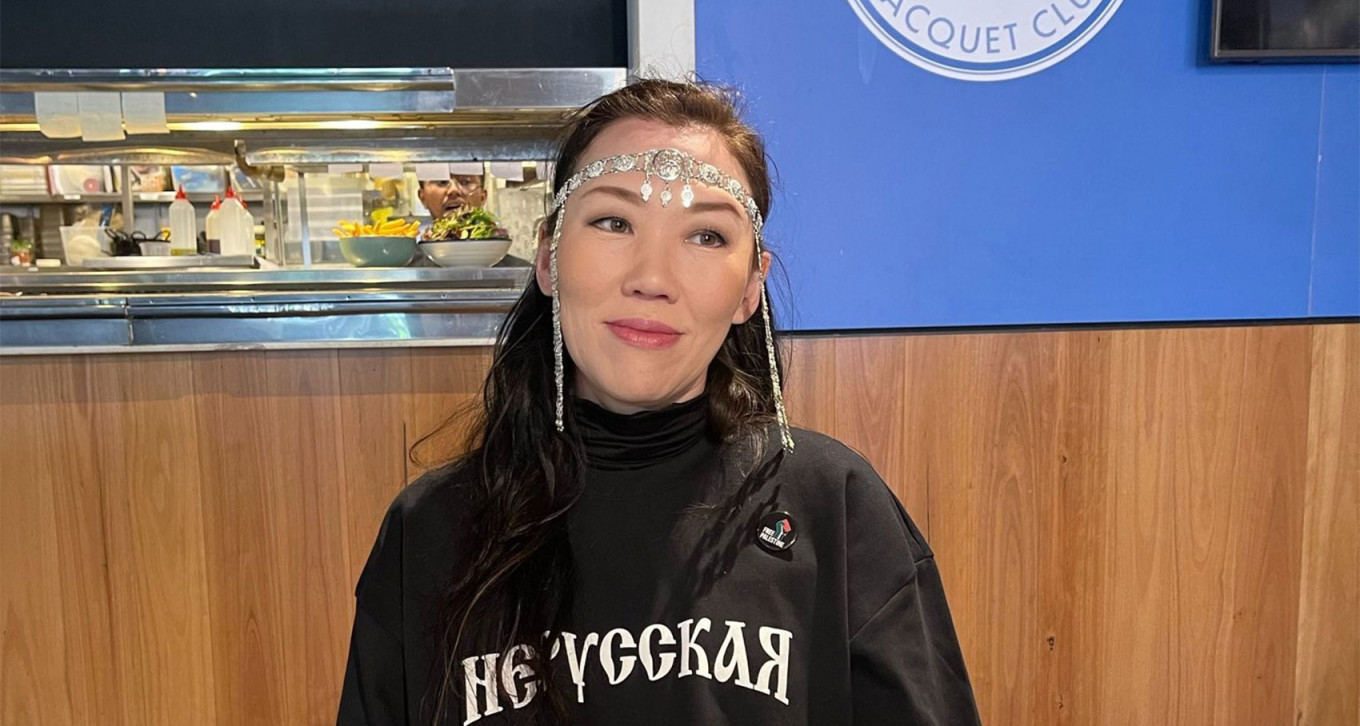  Kondakova poses in a T-shirt by 4 Oirad, an indigenous brand from the republic of Kalmykia, that reads "I'm not Russian." Courtesy photo 