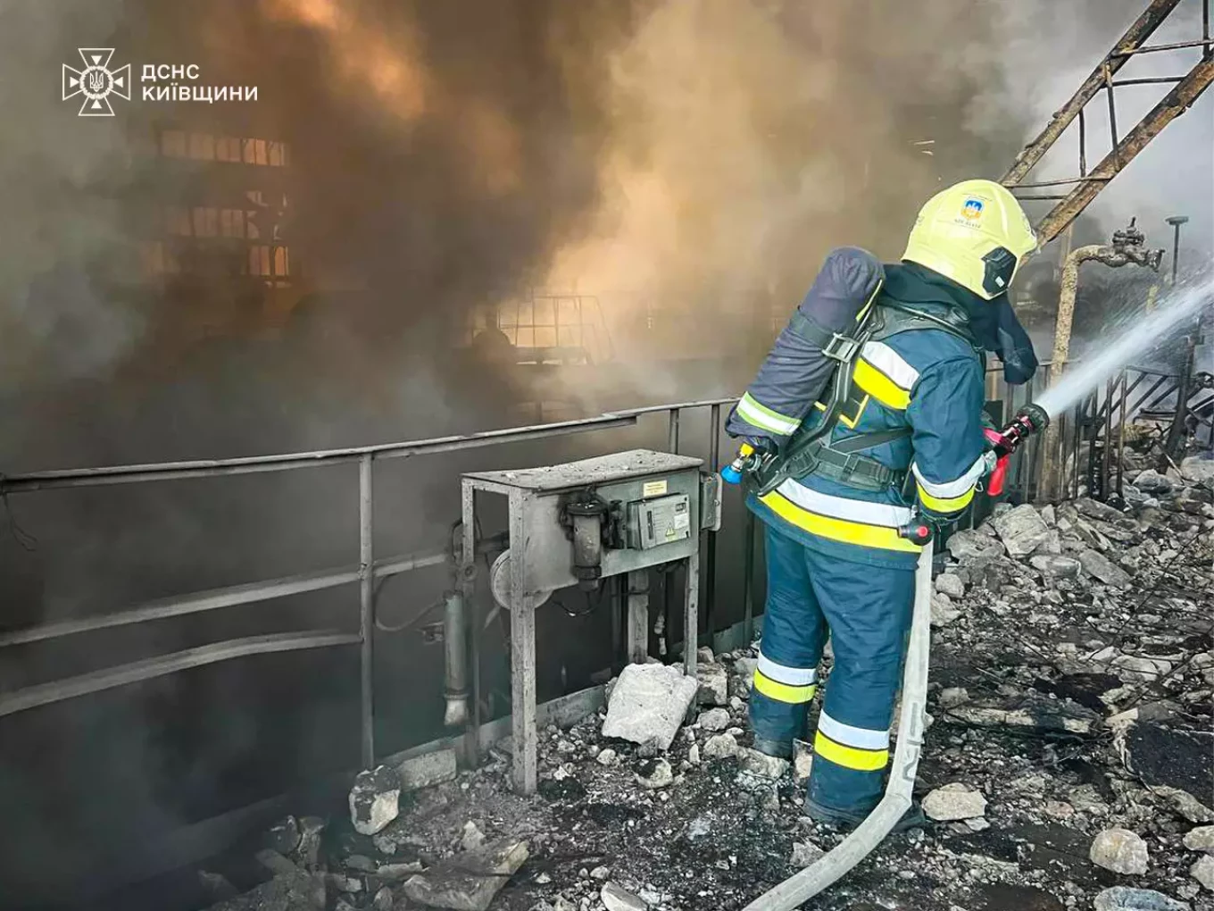  A firefighter at the Trypilska power plant near Kyiv, which was destroyed by multiple Russian missiles on April 11. State Emergency Service of Ukraine 