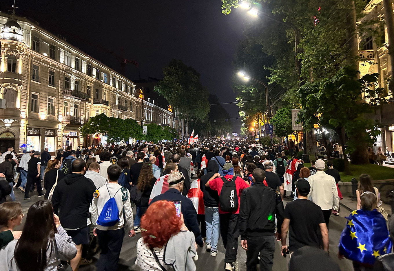  Demonstrators march down Tbilisi’s main thoroughfare Rustaveli Avenue. MT 