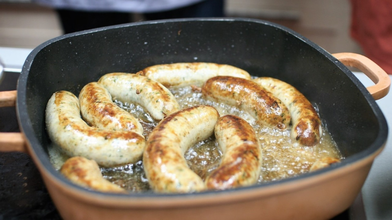  There's nothing better that fried sausage for a holiday meal. Olga and Pavel Syutkin 